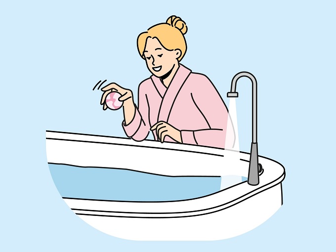 バスタブにお湯を張り入浴剤を入れようとしている女性のイラスト
