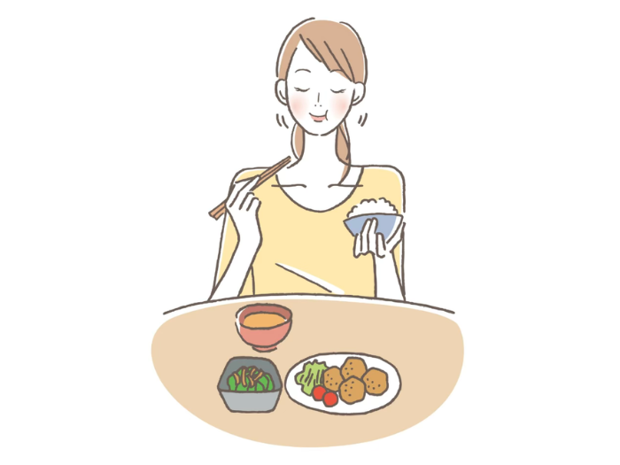 食事をする女性