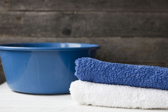 洗面器とタオルの画像