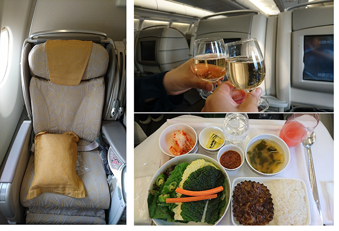 飛行機の座席と機内食、シャンパンの写真